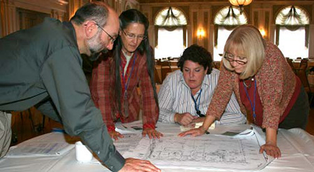 people working together over plans