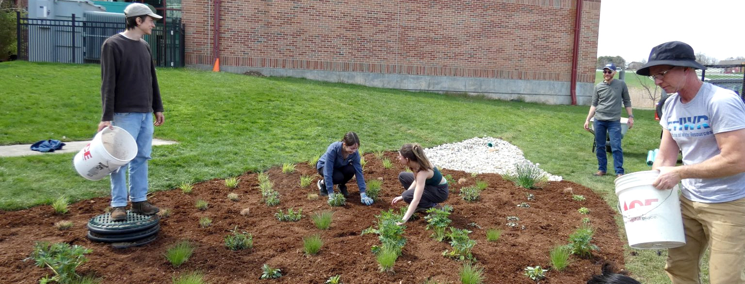 Mike Dietz and students installing rain garden near UConn Dairy Barn